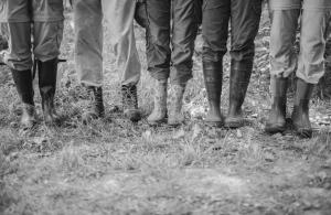 5 pairs of feet wearing boots